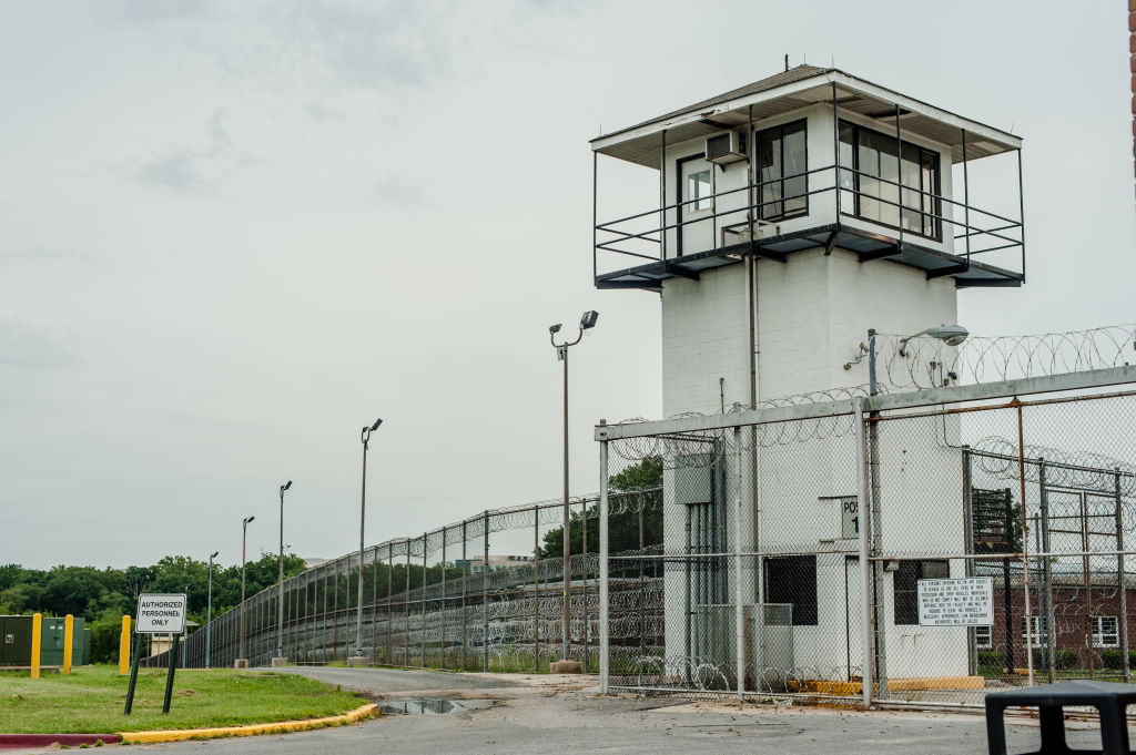 Stephen Moyer, Secretary of the Maryland Dept of Public Safety and Correctional Services, tours the Correctional Institution for Women with the warden, Margaret Chippendale.